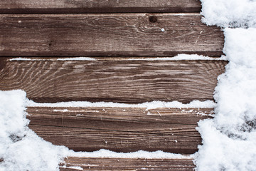 Snow on the wood background