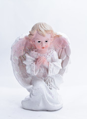 little Christmas angel on a white background