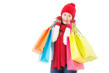 colorful shopping bags holding by happy pretty asian woman
