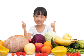 Fototapeta premium Asian Chinese little girl thumbs up with fruit and vegetable