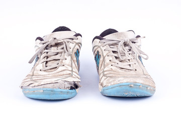 Old vintage damaged futsal sports shoes  on white background  isolated 
