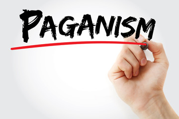 Hand writing Paganism with marker, concept background