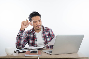 business man with laptop notebook and smartphone in the office