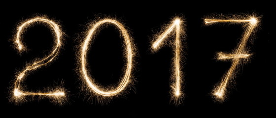 New year font sparkler numbers on black background