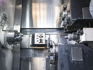 High precision CNC machining center working, operator machining