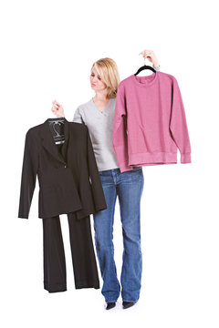 Choices: Woman Deciding Between Fancy Suit Or Lazy Sweatshirt