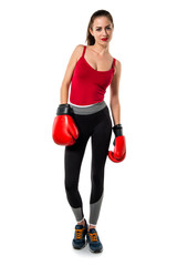 Pretty sport woman with boxing gloves