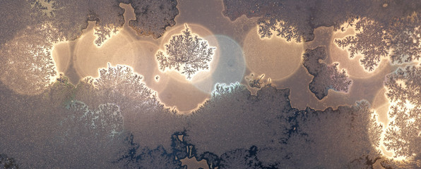 winter lights and ice on the glass