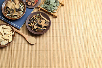 Traditional Chinese medicine on bamboo desk