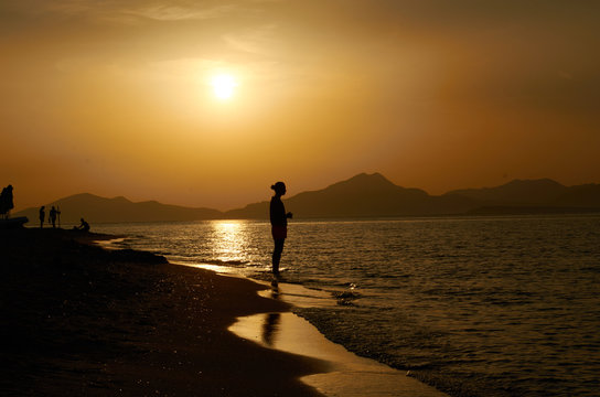 Tropical sunset and the shot on the beach