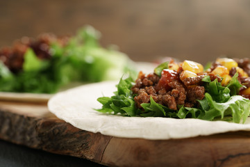 open tortilla with beef, frillice and corn, organic fastfood