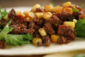 open tortilla with beef, frillice and corn, organic fastfood