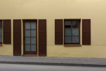 Classic European building with windows and shutters