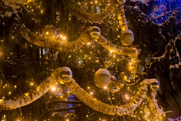 Details of Christmas tree at night.