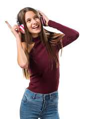 Obraz na płótnie Canvas Young teenager girl listening music