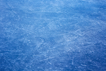 Texture of a blue ice with scratches on surface.