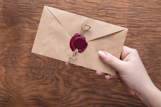 envelope in the hand