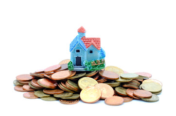 Collect coins for buy a house concept.