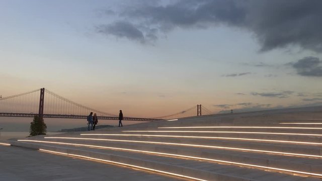Silhouette of People Walking On Top of MAAT Museum, Lisbon Sunset. Museum of Art, Architecture and Technology is a new cultural proposal for the city of Lisbon.