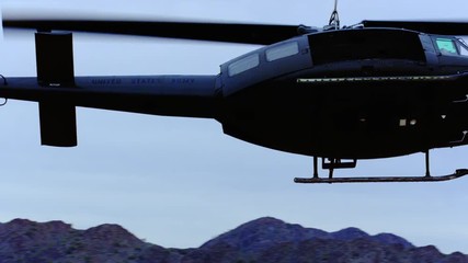 Huey helicopter banks left.