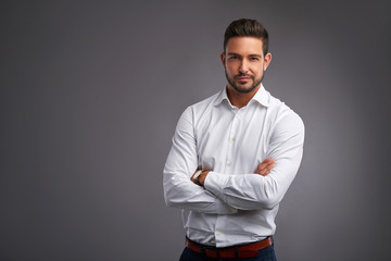 Confident young man smiling	