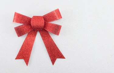 Red bow for presents on white background