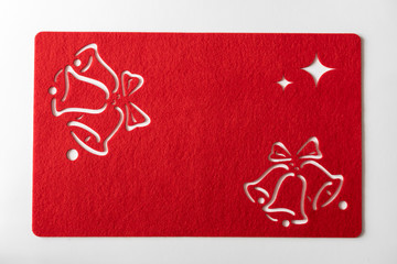red felt napkin with bells, stars and snowflakes