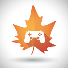 Isolated orange leaf with  a game pad