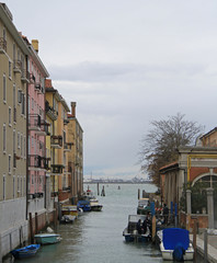 the narrow water canal in Venice