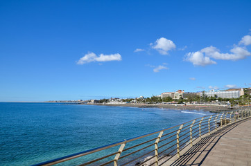Fototapeta na wymiar View at the San Augustin beach from the promenade along the coas