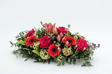 olorful flower arrangement wreath for funerals isolated on white
