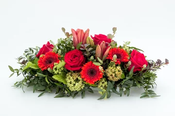 Tuinposter olorful flower arrangement wreath for funerals isolated on white © Marko