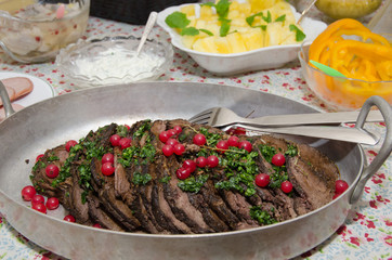Moose steak in a bowl