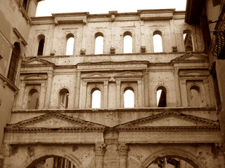 Fototapeta na wymiar Porta Borsari Gate in Sepia Tone, the Ancient Roman Gate in the City of Verona, Italy 