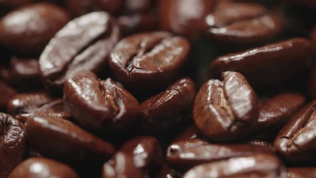 4K Aroma of coffee, strong Roast, Coffee Bean macro, static scene and rising up the smoke