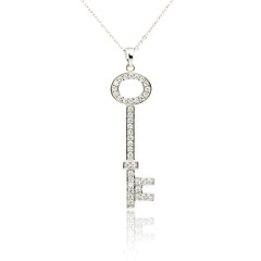 Silver diamond key pendant isolated on white