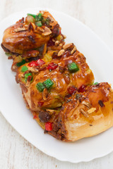 cake with dry fruits on white dish