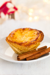 portuguese cookie pastel de nata on white plate