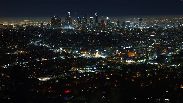 Rack focus of the Los Angeles skyline city lights at night