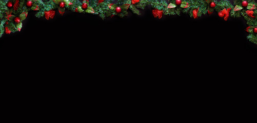 Xmas black background framed with season decorations, space for a text.
