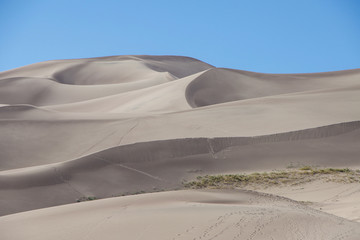 Fototapeta na wymiar Bold shadows on sand dunes in Colorado
