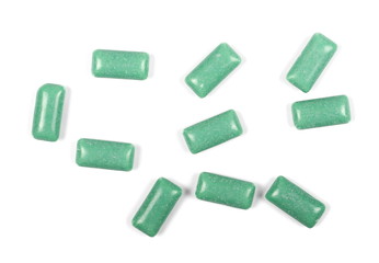green chewing gum isolated on white