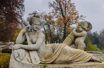 a beautiful sculpture in the autumn Lazienki Krolewskie Park, Warsaw, Poland