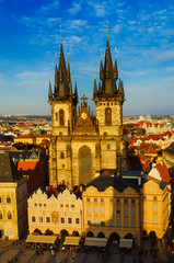 Obraz premium Old Town Square with Church of Our Lady before Tyn in eastern european Czech capital Prague - sunny view from Town Hall