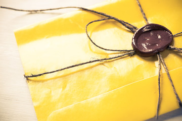 Letter with seal on table