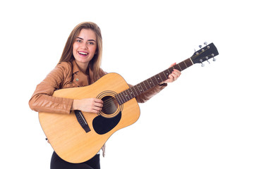 Fototapeta premium Young woman holding a guitar 
