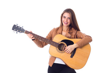 Fototapeta premium Young woman holding a guitar 