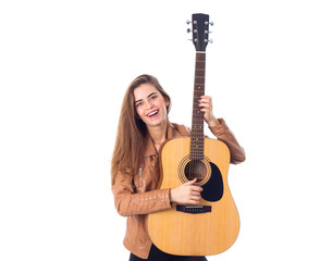 Fototapeta premium Young woman holding a guitar 