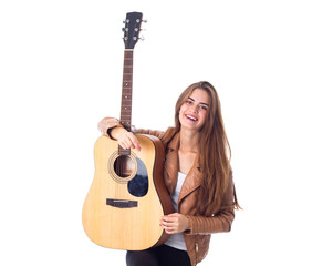 Young woman holding a guitar 