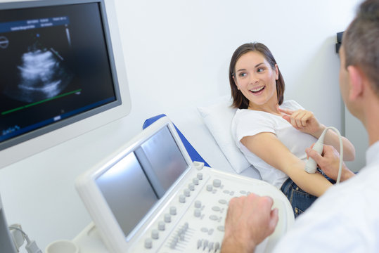 pregnant woman checking her echography